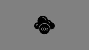 A black cloud icon with the letters "CO2" inside a circle, set against a gray background