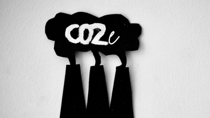 Artistic image symbolizing greenhouse gas emissions with the word CO2